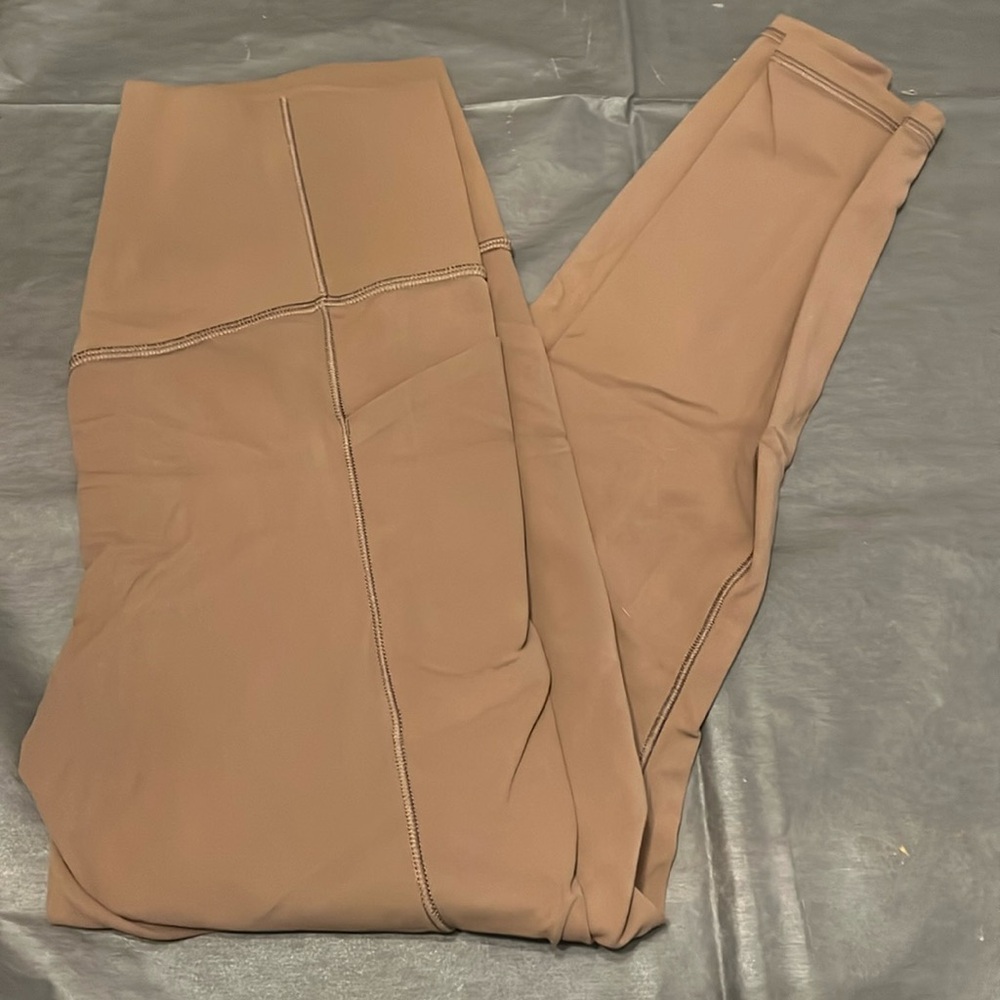 Athleta salutation stash tight - small
